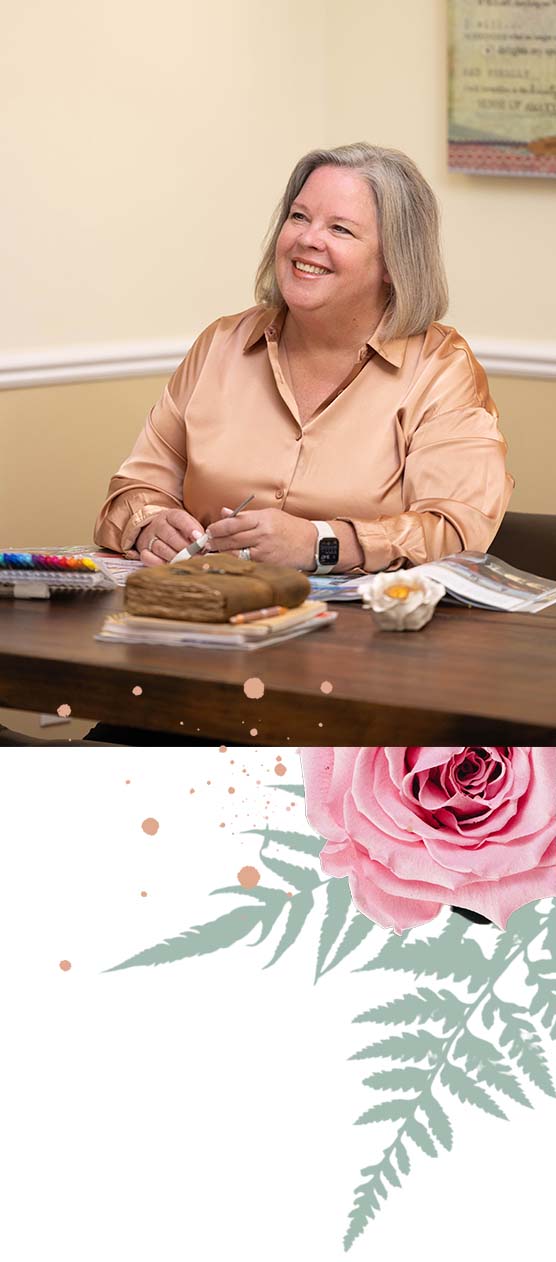 Sandy Mitsch working at her desk
